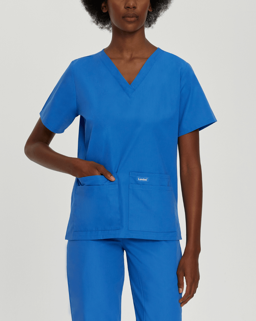 Royal blue scrub top for women with four accessory pockets