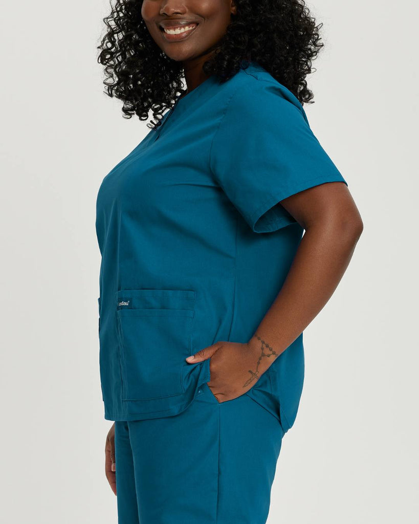 Woman wearing comfortable durable Caribbean scrubs