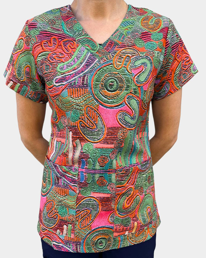 Orange and green Indigenous printed patterned scrubs