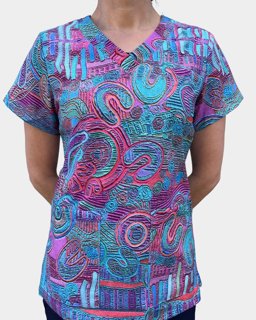 Colourful bright scrubs with Aboriginal artwork patterns